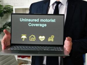 Business concept meaning Uninsured motorist Coverage with phrase on the page.