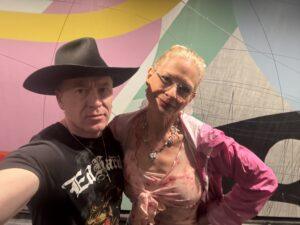 Shane and Holly posing for the camera at a concert